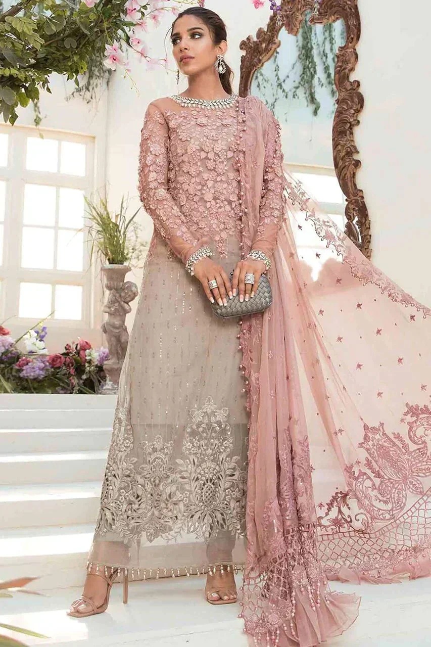 Deep and Sea pakistani fashion outfit with coordinated formal styling.